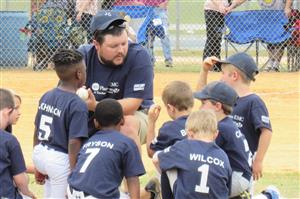 Coach Drew Allen and Team after game chats and prayers